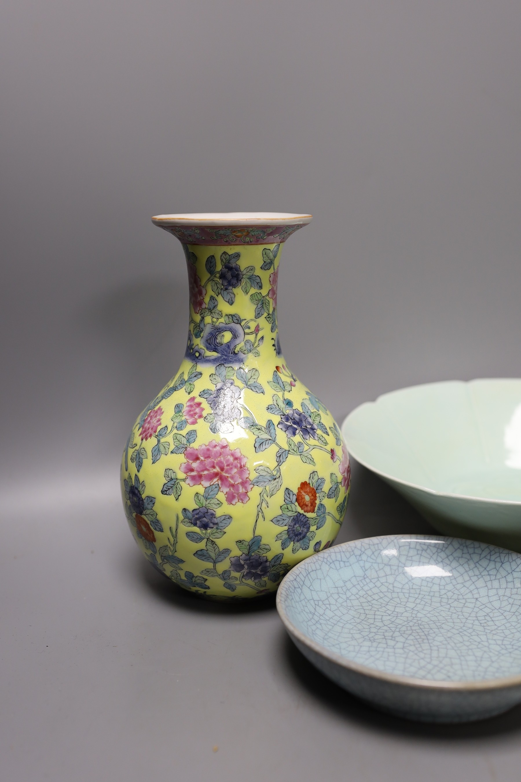 A group of Chinese crackle glaze ceramics, a yellow ground vase, celadon glazed bowl etc